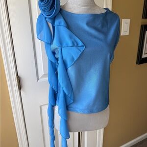 Elegant Blue Sleeveless Top with Floral Detail